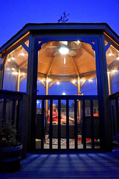 12 Foot Wood Gazebo in a Box with Screens at Night